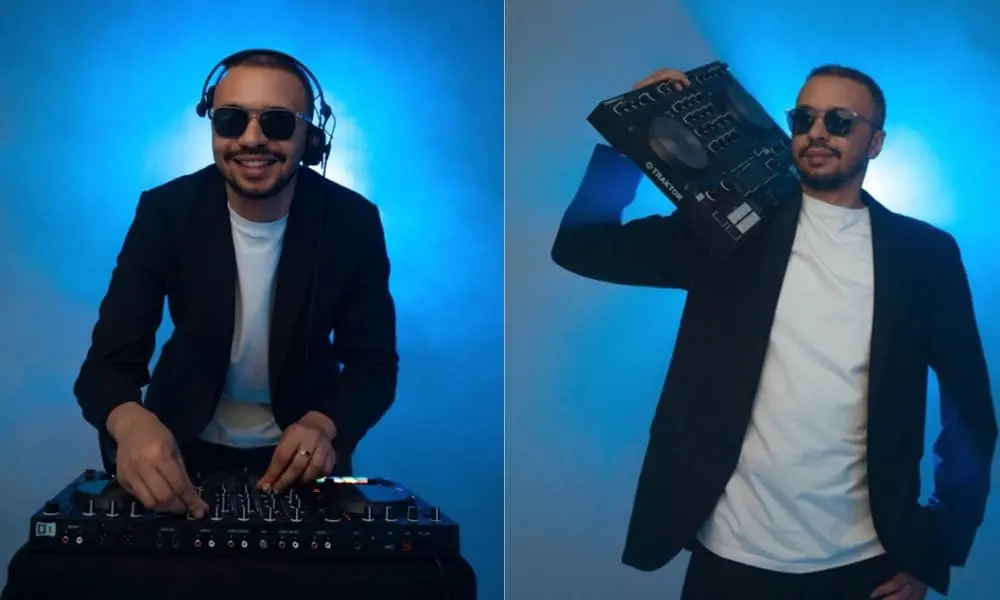 DJ Help am Controller im blauen Bühnenlicht